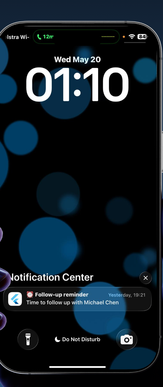 iPhone lock screen showing a Leado follow-up reminder push notification